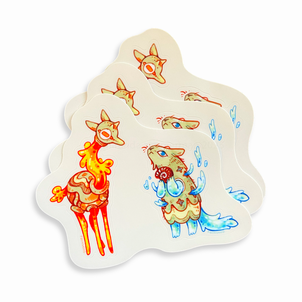 A matte vinyl sticker sheet with two individual stickers on it. On the left is a mythical red deer creature, and on the right is a blue fox creature. The background of the sticker is ivory. This photo shows three of them stacked together, but this listing is for one single sheet.