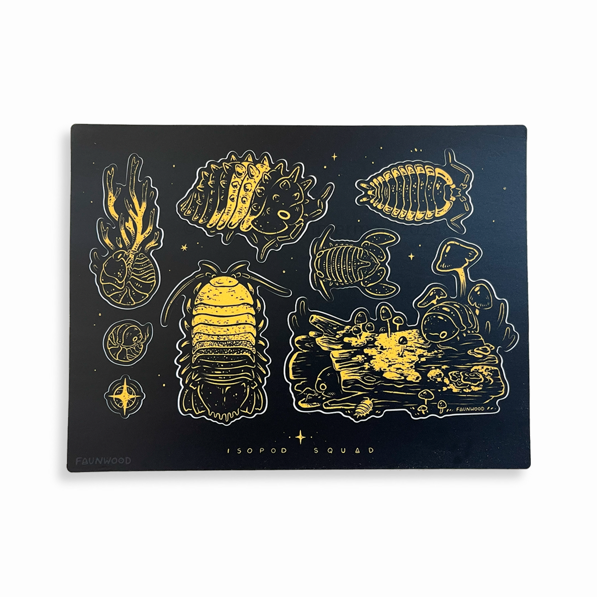 A matte vinyl sticker sheet with several black and yellow isopod illustrations.