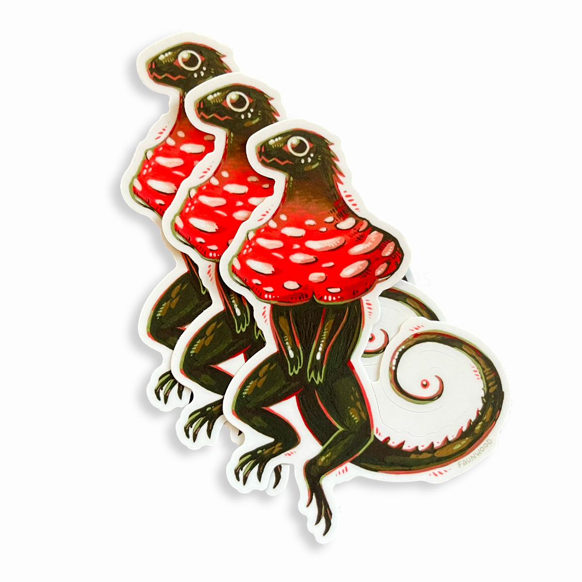 Three matte vinyl sticker of a green "frilled lizard" with a red and white mushroom cap in place of frills.  This listing is for a single sticker, even though three are shown in this photo.
