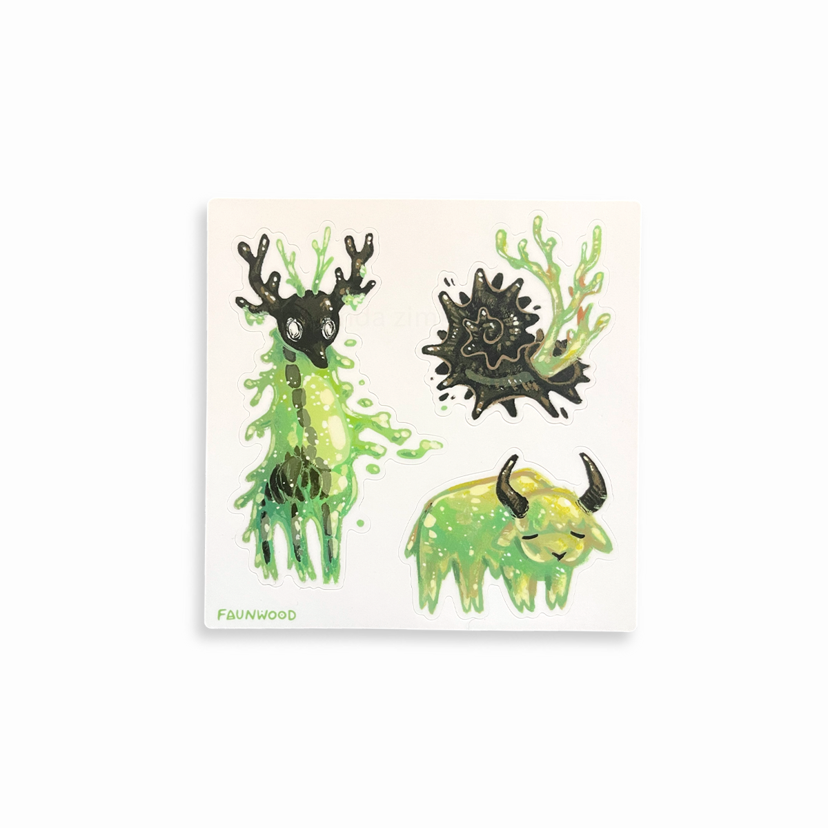 A matte vinyl sticker sheet featuring three illustrated "green slime" creature designs.