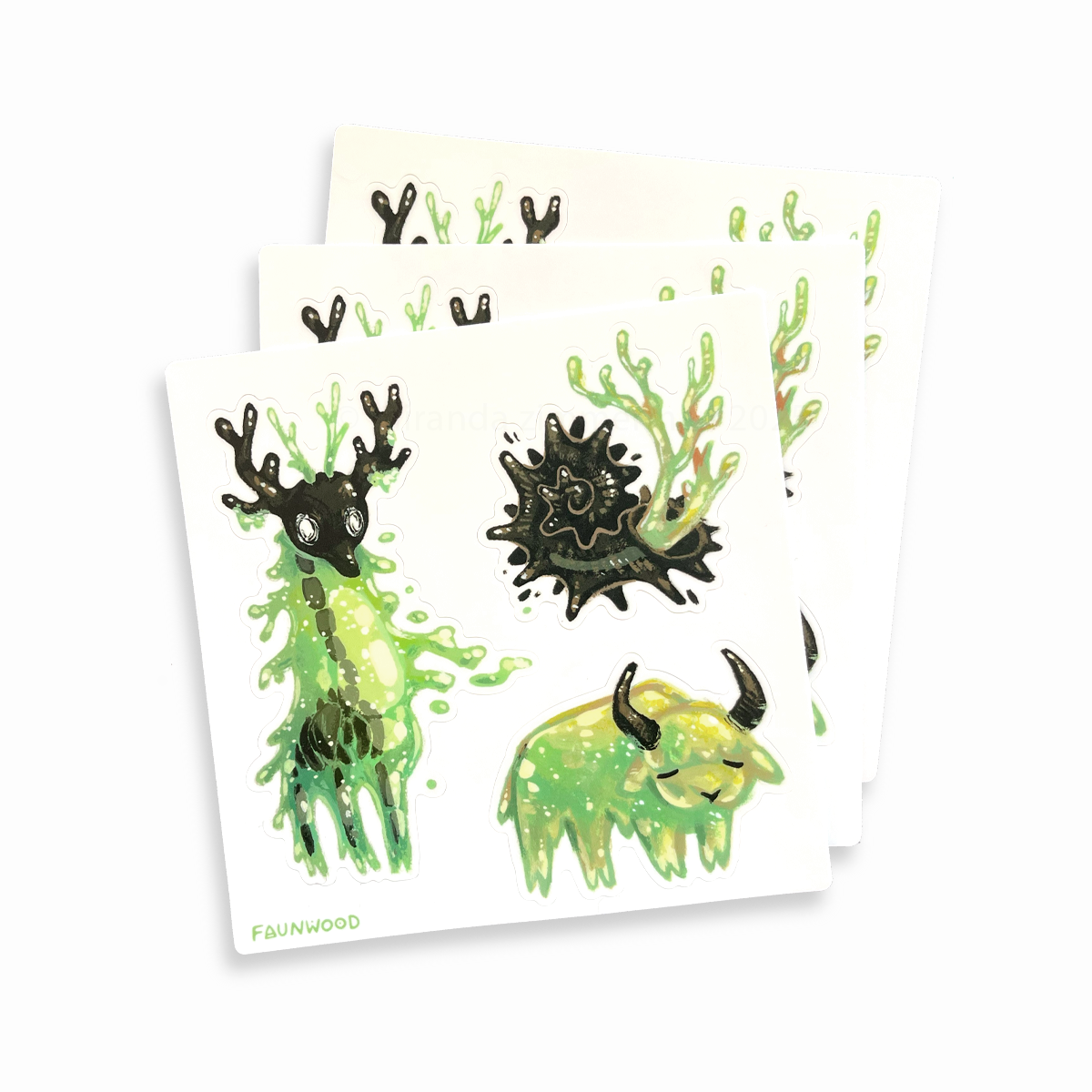 Three matte vinyl sticker sheet featuring three illustrated "green slime" creature designs.  This listing is for a single sheet, even though three are shown in this photo.